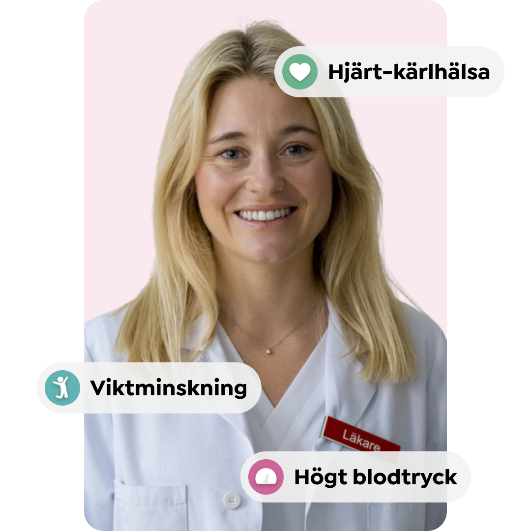 Bild på en blond, kvinnlig läkare, ca 40 år, i vit läkarrock.